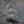 “Sailing ship with billowing white sails and seabirds, surrounded by sea spray and dark teal waves.”