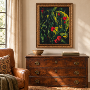 Where the Garden Keeps Its Secrets framed painting displayed on a wall above an antique wooden chest in a cozy reading corner
