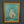 Framed painting of a polar bear on a textured wall