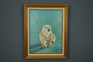 Framed painting of a polar bear on a textured wall