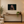 Eyes Beyond Sight replacement artwork as a small 24 × 16 canvas in a modern living room