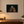 The Daughter of Distant Fire 24 × 16 inch canvas displayed at a smaller scale in a home office