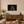 The Daughter of Distant Fire 24 × 16 inch canvas displayed at a smaller scale in a family room
